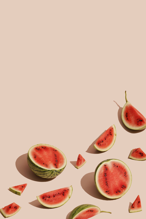 Sliced Watermelons on Pink Background